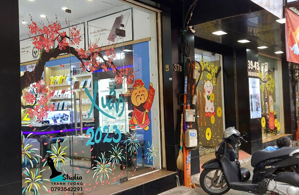 ve kinh tet shop cua hang di dong MInh Tuan studio tranh tuong11 - Vẽ tranh kính: Vẽ kính tết trang trí, vẽ trang trí cửa kính đẹp ấn tượng
